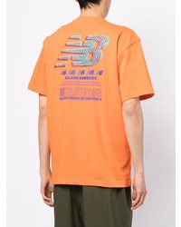 orange T-Shirt mit einem Rundhalsausschnitt von New Balance