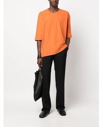 orange T-Shirt mit einem Rundhalsausschnitt von Homme Plissé Issey Miyake