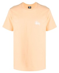 orange T-Shirt mit einem Rundhalsausschnitt von Stussy