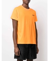 orange T-Shirt mit einem Rundhalsausschnitt von Moschino