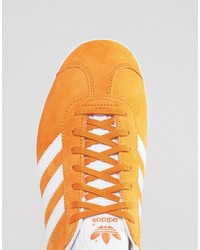 orange Turnschuhe von adidas