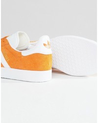 orange Turnschuhe von adidas