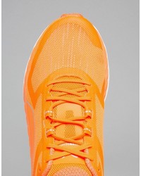 orange Turnschuhe von Puma