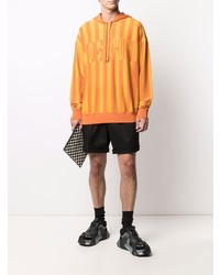 orange vertikal gestreifter Pullover mit einem Kapuze von Moschino