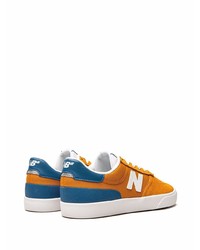 orange Wildleder niedrige Sneakers von New Balance
