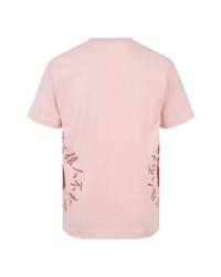 rosa bedrucktes T-Shirt mit einem Rundhalsausschnitt von A Bathing Ape