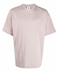 rosa T-Shirt mit einem Rundhalsausschnitt von Nike