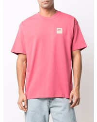 rosa T-Shirt mit einem Rundhalsausschnitt von Nike