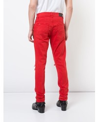 rote enge Jeans mit Destroyed-Effekten von Amiri