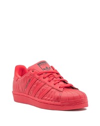 rote Leder niedrige Sneakers von adidas