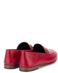 rote Slipper von Gucci