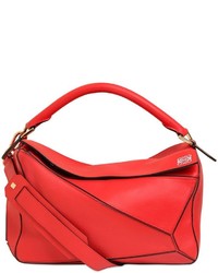 rote Taschen mit geometrischem Muster