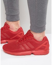 rote Turnschuhe von adidas