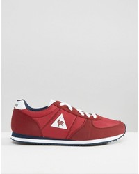 rote Turnschuhe von Le Coq Sportif