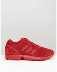 rote Turnschuhe von adidas