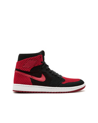 rote und schwarze hohe Sneakers von Jordan