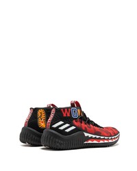 rote und schwarze Sportschuhe von adidas