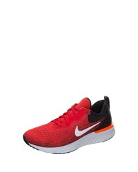 rote und schwarze Sportschuhe von Nike