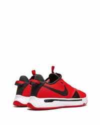 rote und schwarze Sportschuhe von Nike