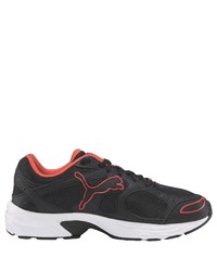 rote und schwarze Sportschuhe von Puma