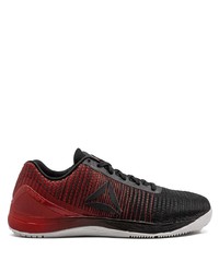 rote und schwarze Sportschuhe von Reebok