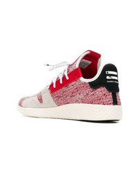 rote und weiße Sportschuhe von Adidas By Pharrell Williams