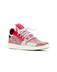 rote und weiße Sportschuhe von Adidas By Pharrell Williams