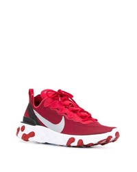 rote und weiße Sportschuhe von Nike