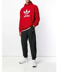 roter bedruckter Pullover mit einem Kapuze von adidas