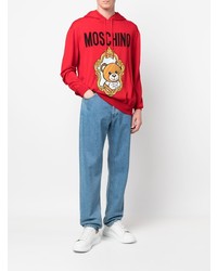 roter bedruckter Pullover mit einem Kapuze von Moschino