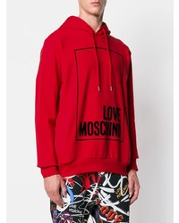 roter bedruckter Pullover mit einem Kapuze von Love Moschino