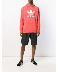 roter bedruckter Pullover mit einem Kapuze von adidas