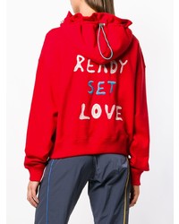 roter bedruckter Pullover mit einer Kapuze von Mira Mikati