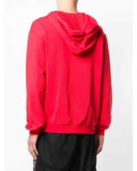 roter Pullover mit einem Kapuze von Moschino