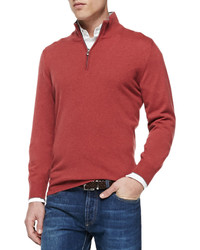 roter Pullover mit einem Reißverschluss am Kragen