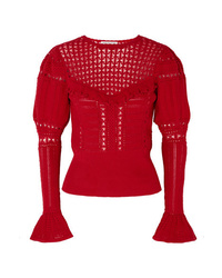 roter Pullover mit einem Rundhalsausschnitt mit Rüschen