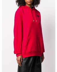 roter Pullover mit einer Kapuze von Moschino