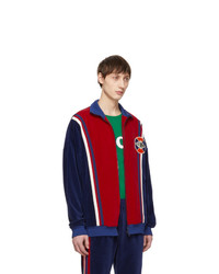 roter und dunkelblauer Pullover mit einem Reißverschluß von Gucci