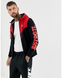 roter und schwarzer Pullover mit einem Kapuze von Nike