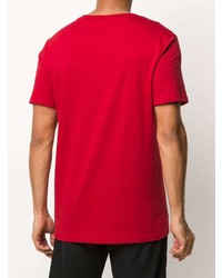 rotes bedrucktes T-Shirt mit einem Rundhalsausschnitt von Moschino