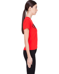 rotes bedrucktes T-Shirt mit einem Rundhalsausschnitt von Comme des Garcons