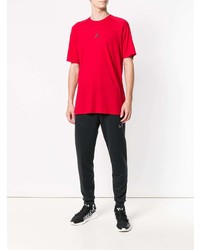 rotes bedrucktes T-Shirt mit einem Rundhalsausschnitt von Nike