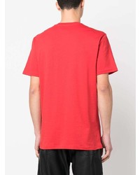 rotes bedrucktes T-Shirt mit einem Rundhalsausschnitt von Moschino