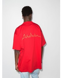 rotes bedrucktes T-Shirt mit einem Rundhalsausschnitt von Vetements