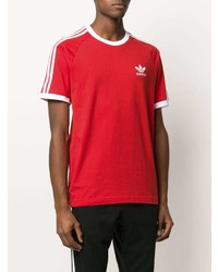 rotes und weißes bedrucktes T-Shirt mit einem Rundhalsausschnitt von adidas