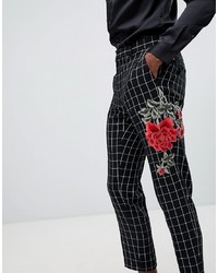 schwarze Anzughose mit Blumenmuster