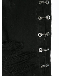 schwarze enge Jeans aus Baumwolle mit Destroyed-Effekten von Amiri