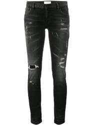 schwarze enge Jeans aus Baumwolle mit Destroyed-Effekten von Faith Connexion