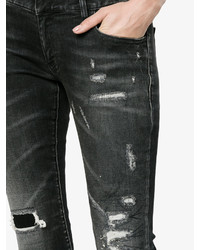 schwarze enge Jeans aus Baumwolle mit Destroyed-Effekten von Faith Connexion