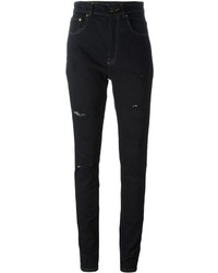 schwarze enge Jeans aus Baumwolle mit Destroyed-Effekten von Saint Laurent